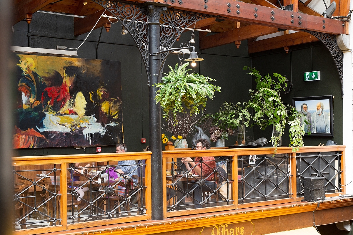 Diners on the balcony area of the Farmgate Cafe in the English Market in Cork city
